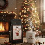 Candy Cane Flavored Coffee package with a steaming mug in a festive setting with a Christmas tree and fireplace.